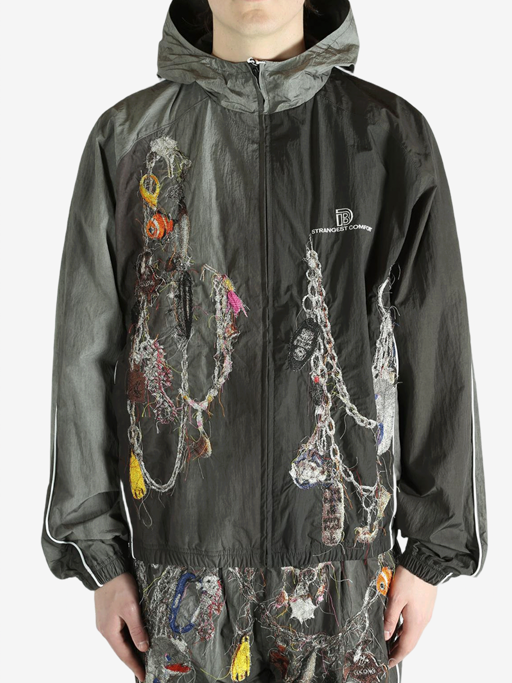 Grey jacket worn by a person, showing the jacket's fit