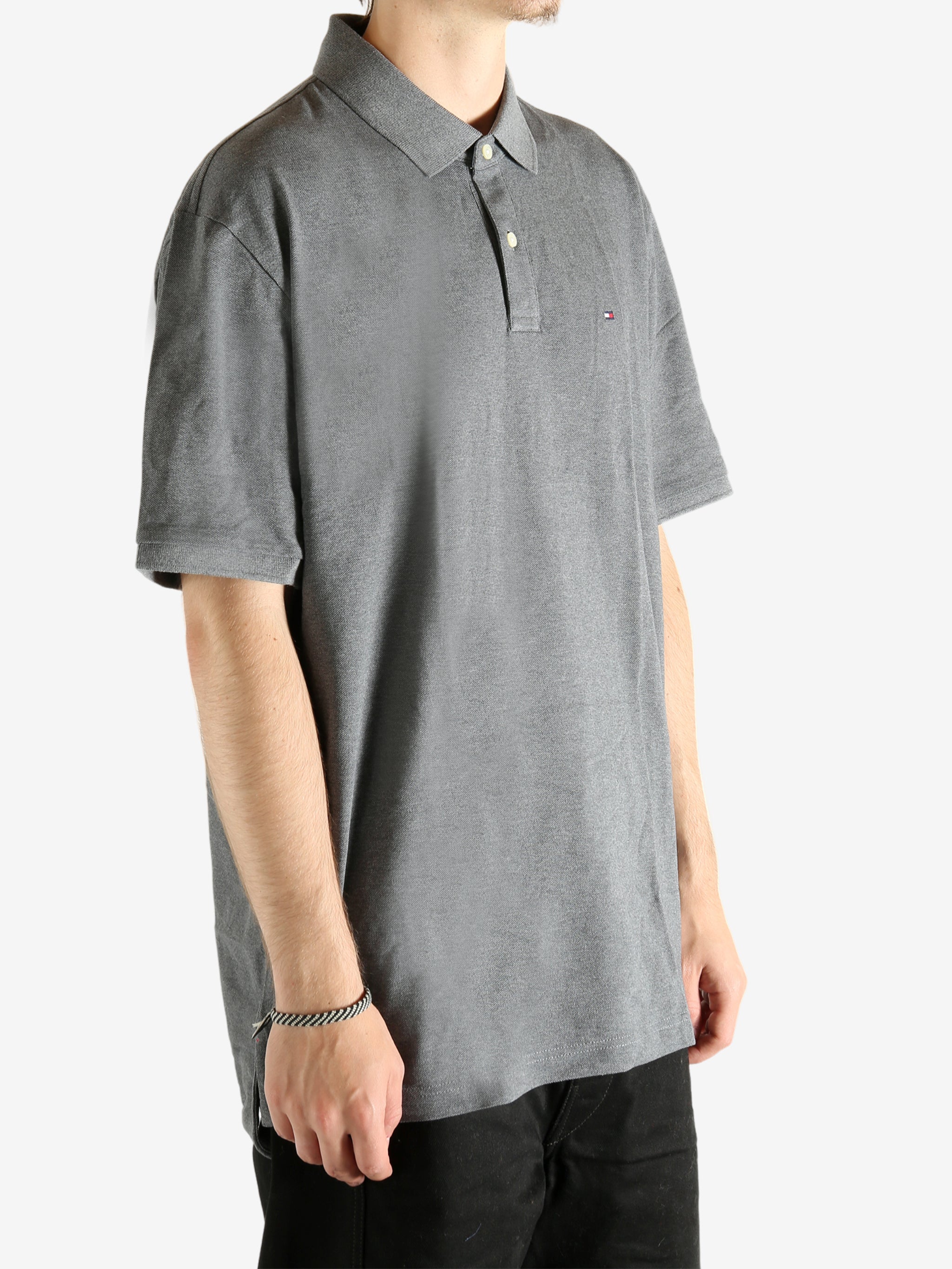 Grey T-shirt worn by a person, showing the T-shirt's fit