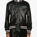 Black jacket worn by a person, showing the jacket fit