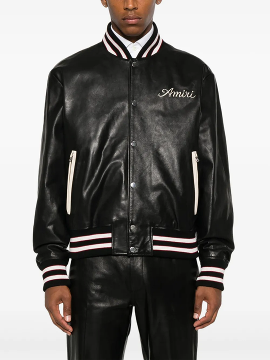 Black jacket worn by a person, showing the jacket fit