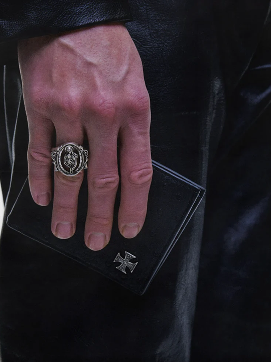 Close up of Grey jewelry, showing detail