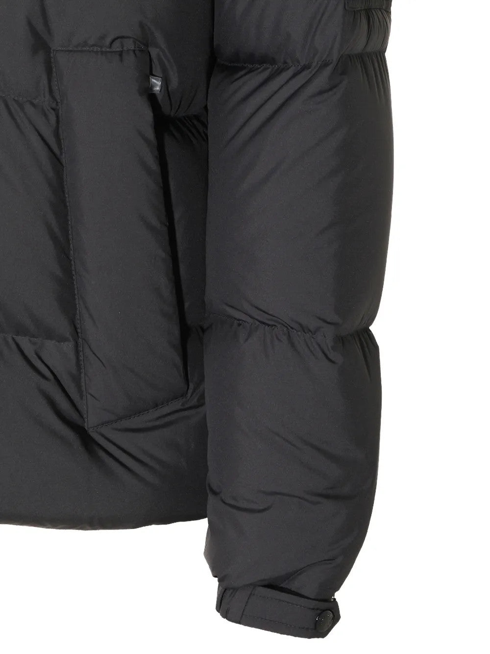 Close up of Black jacket, showing texture of the 100% polyester fabric
