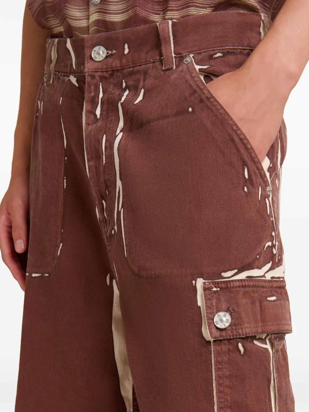 Close up of brown shorts,showing texture of the cotton fabric.