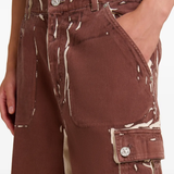 Close up of brown shorts,showing texture of the cotton fabric.