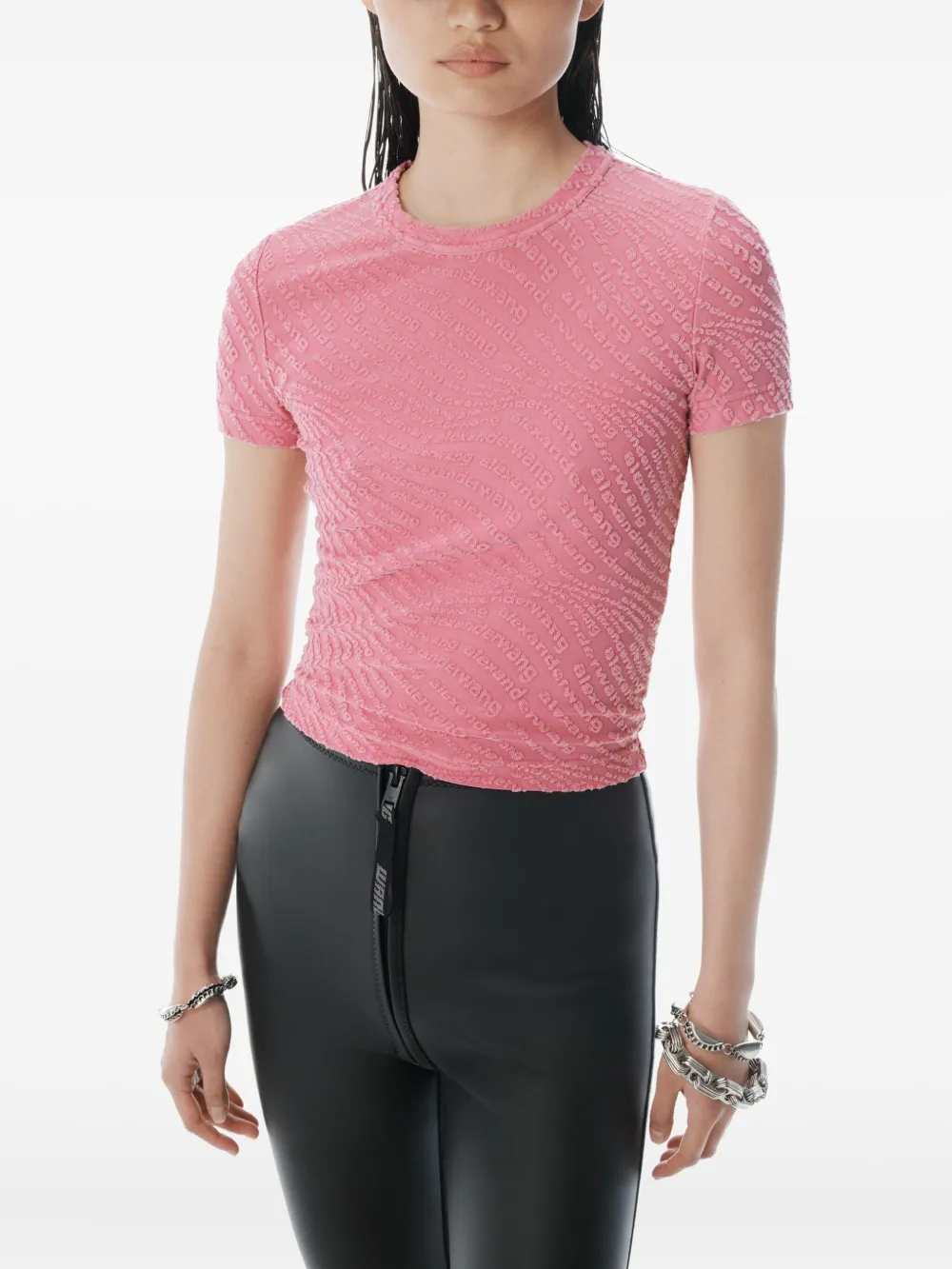 Pink top worn by a person, showing the top fit