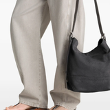 Close up of dark gray,showing texture of the cotton fabric.