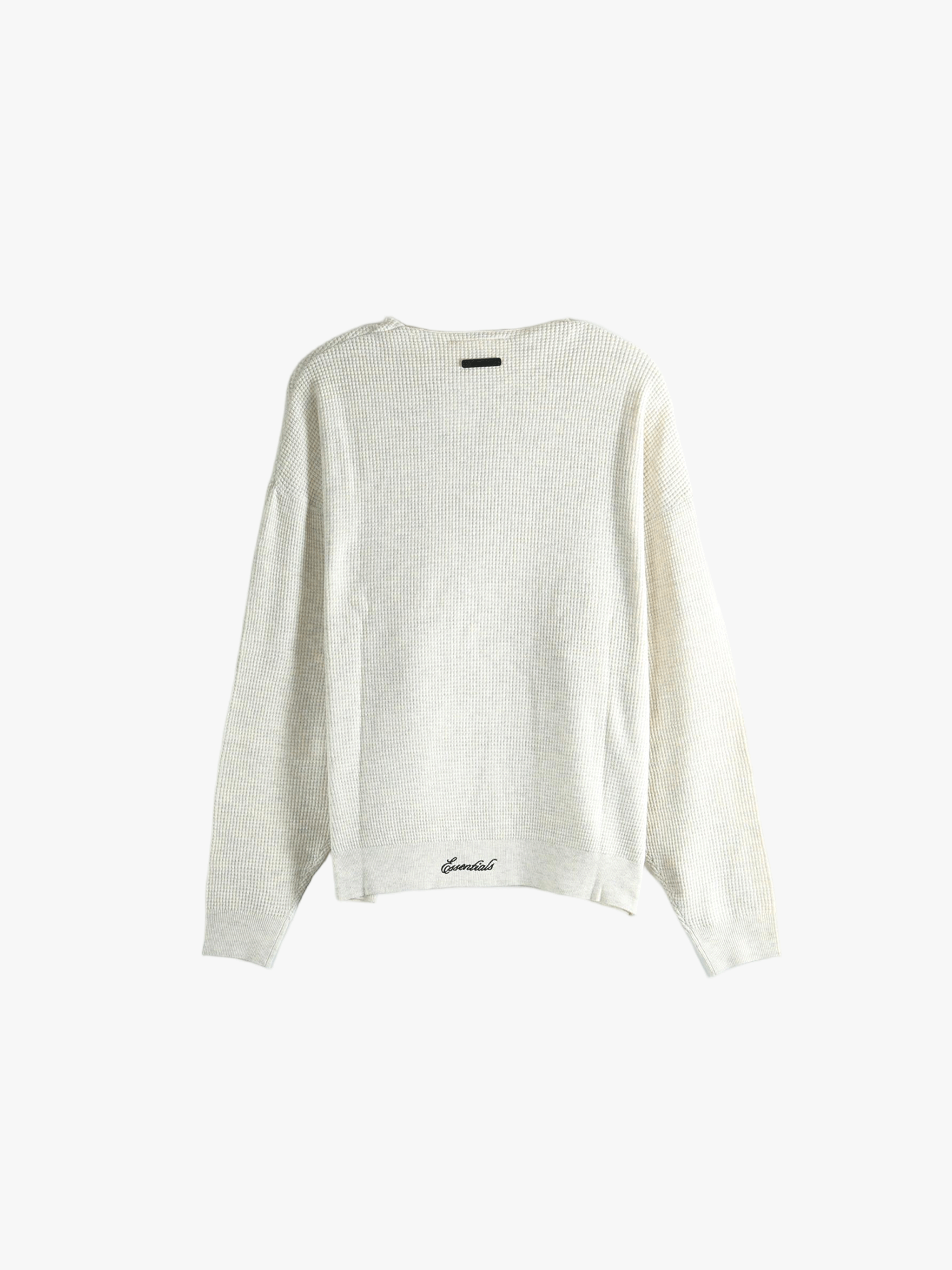 white knitwear, back view