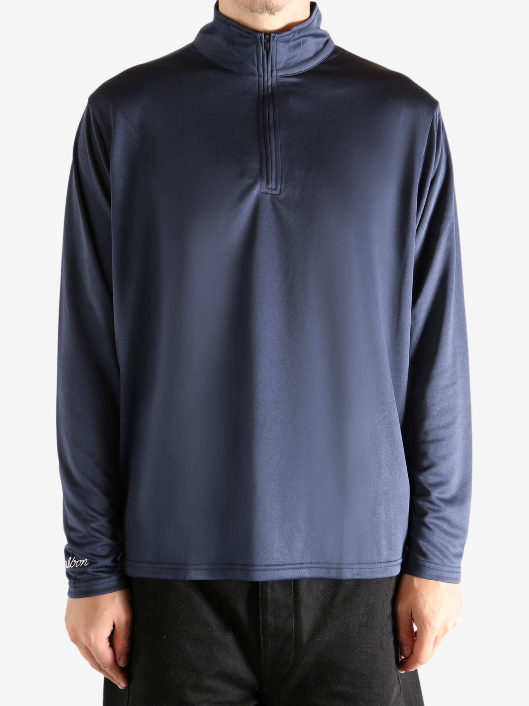 Navy pullover worn by a person, showing the pullover's fit