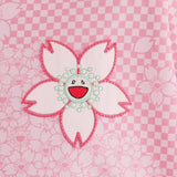 Close up of Pink t-shirt, showing texture of the 100% polyester fabric