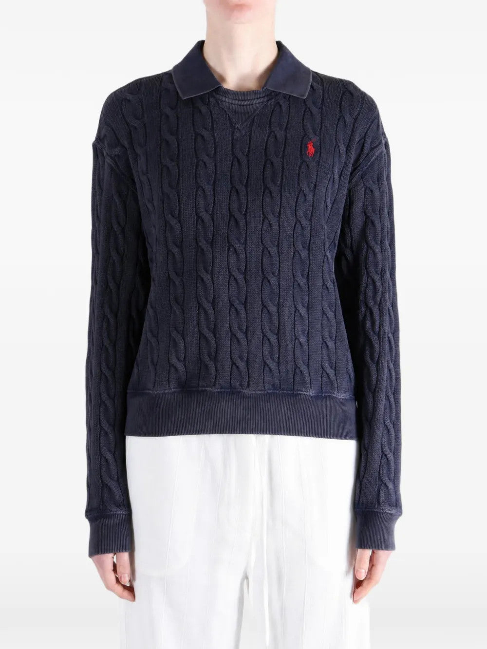 Navy shirt worn by a person, showing the shirt fit