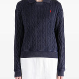 Navy shirt worn by a person, showing the shirt fit