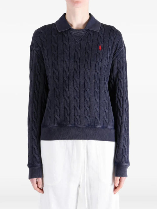 Navy shirt worn by a person, showing the shirt fit