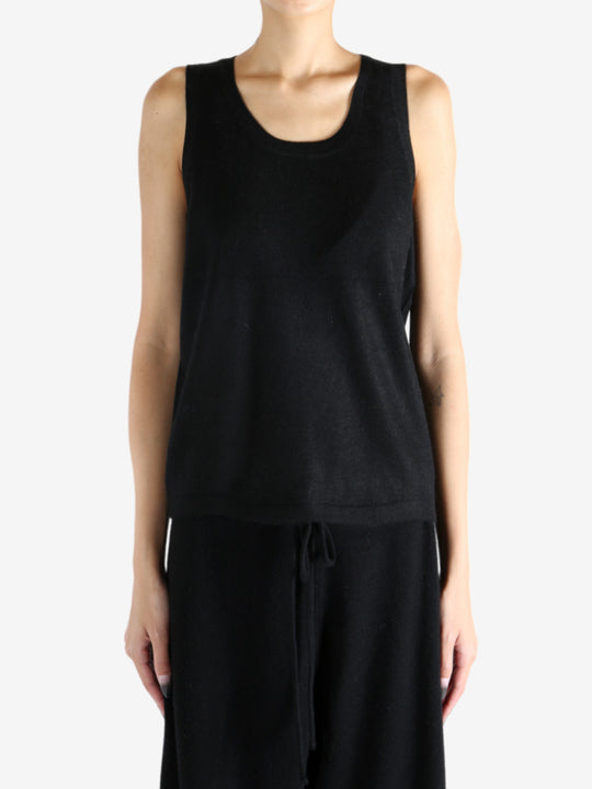 Black worn by a person, showing the top's fit