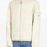 tan jacket worn by a person, showing the jacket fit