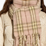 Pink scarf worn by a person, showing the scarf fit