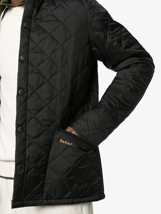 Close up of black jackets, showing texture of the polyester and polyamide fabric