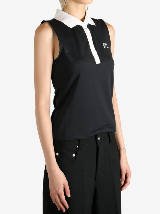 Black shirts worn by a person, showing the shirts fit