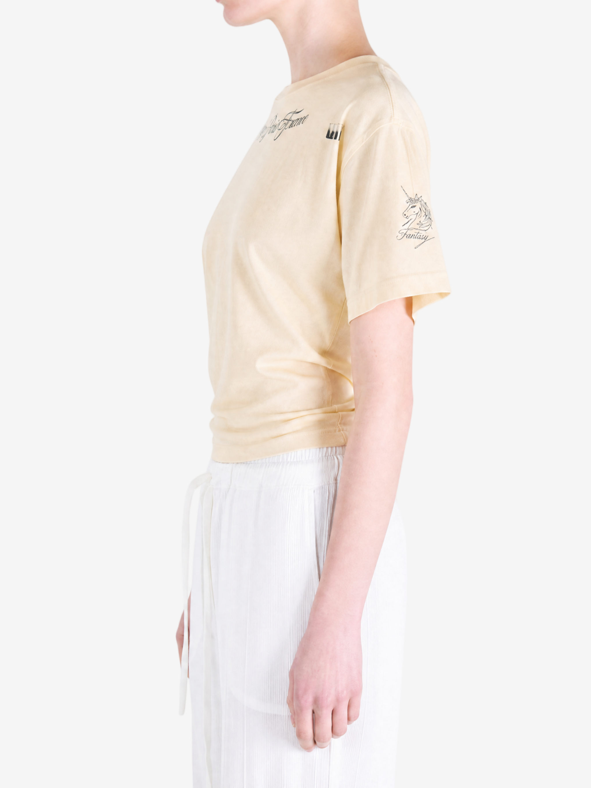 Tan top worn by a person, showing the top fit