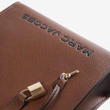 Close up of brown bag,showing texture of the leather fabric