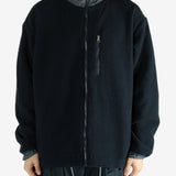 Navy jacket worn by a person, showing the jacket's fit