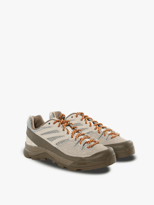 Tan sneakers, side view