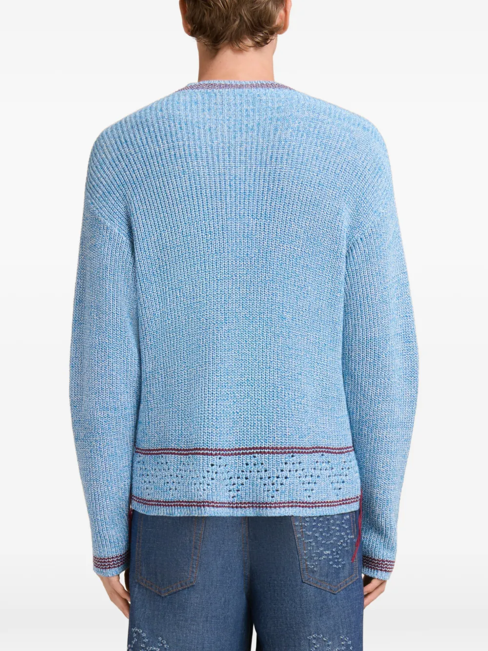 Close up of blue sweater, showing texture of the Cotton fabric