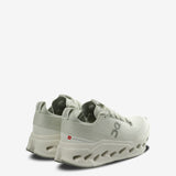 Green sneakers, back view