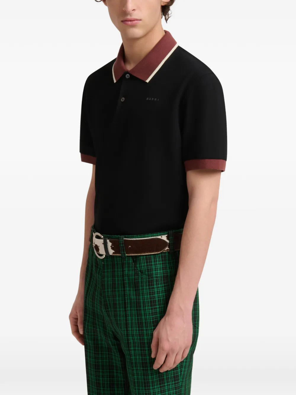 Black t-shirt worn by a person, showing the t-shirt fit