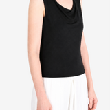 Black top worn by a person, showing the top fit