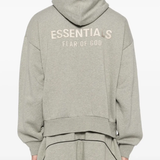 Gery hoodie worn by a person, showing the hoodie fit