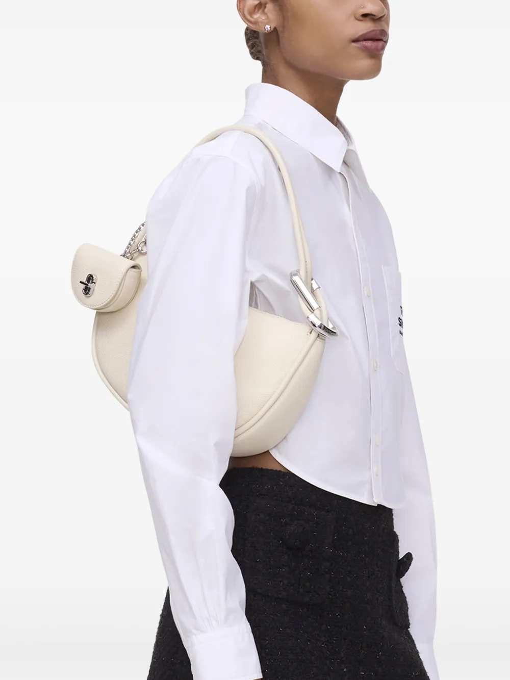 White bag worn by a person, showing the bag fit