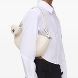 White bag worn by a person, showing the bag fit