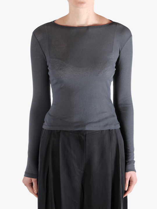 Grey shirt worn by a person, showing the shirt's fit