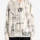 Tan hoodie worn by a person, showing the hoodie fit
