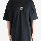 Black t-shirt worn by a person, showing the t-shirt's fit