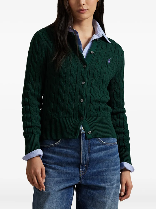 Green cardigan worn by a person, showing the cardigan's fit