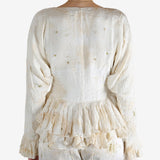 White tops worn by a person, showing the tops's fit