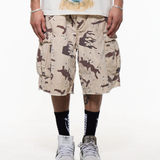 Brown shorts worn by a person, showing the shorts fit