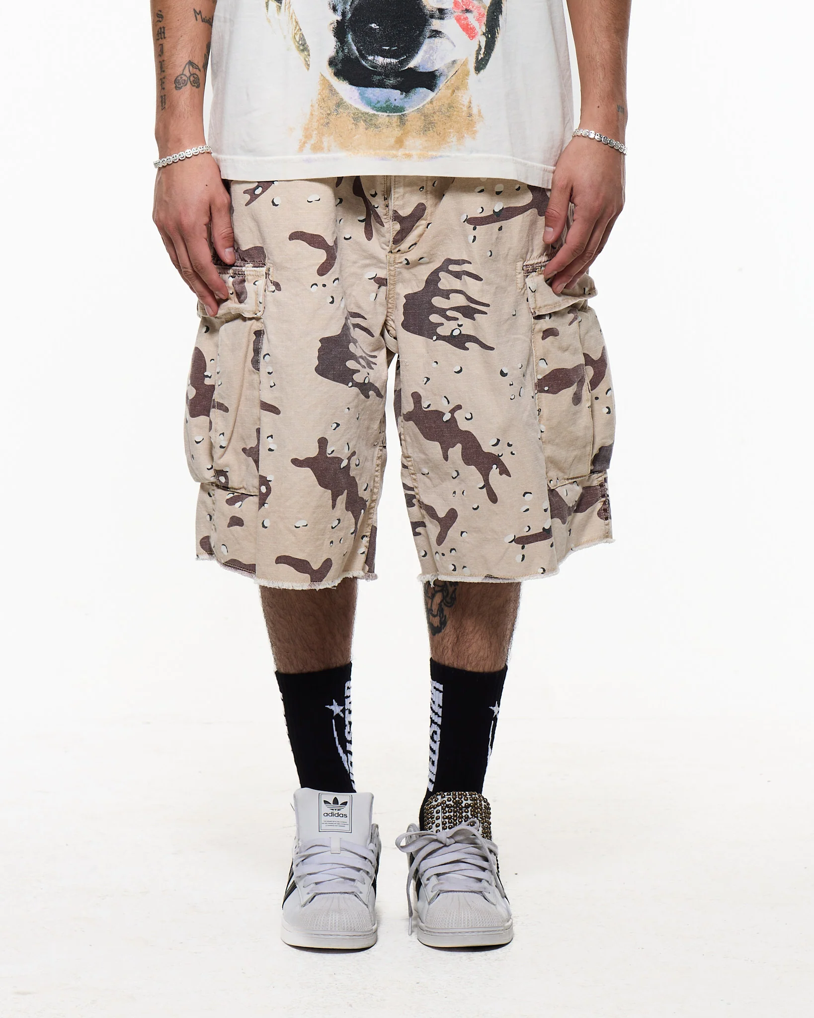 Brown shorts worn by a person, showing the shorts fit