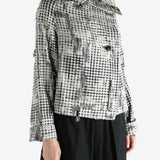 Black jackets worn by a person, showing the jackets fit