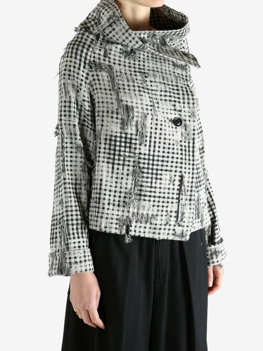 Black jackets worn by a person, showing the jackets fit