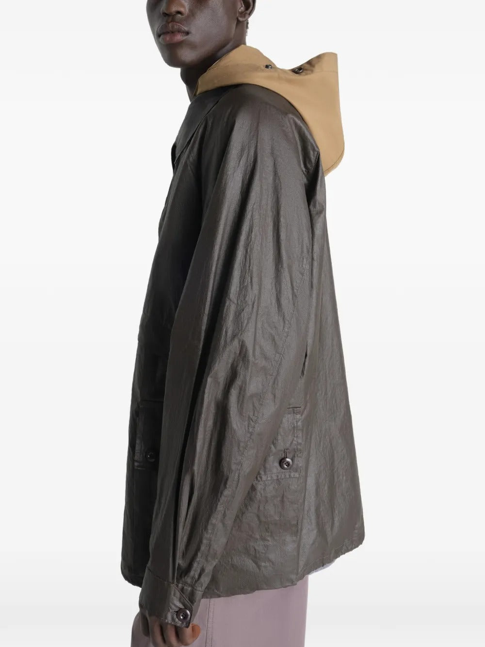 Brown jacket worn by a person, showing the jacket's  fit