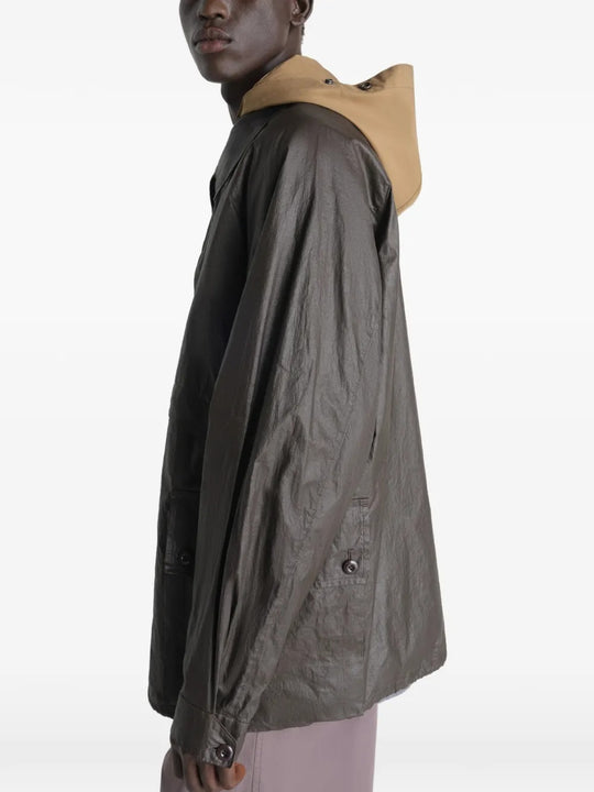 Brown jacket worn by a person, showing the jacket's  fit