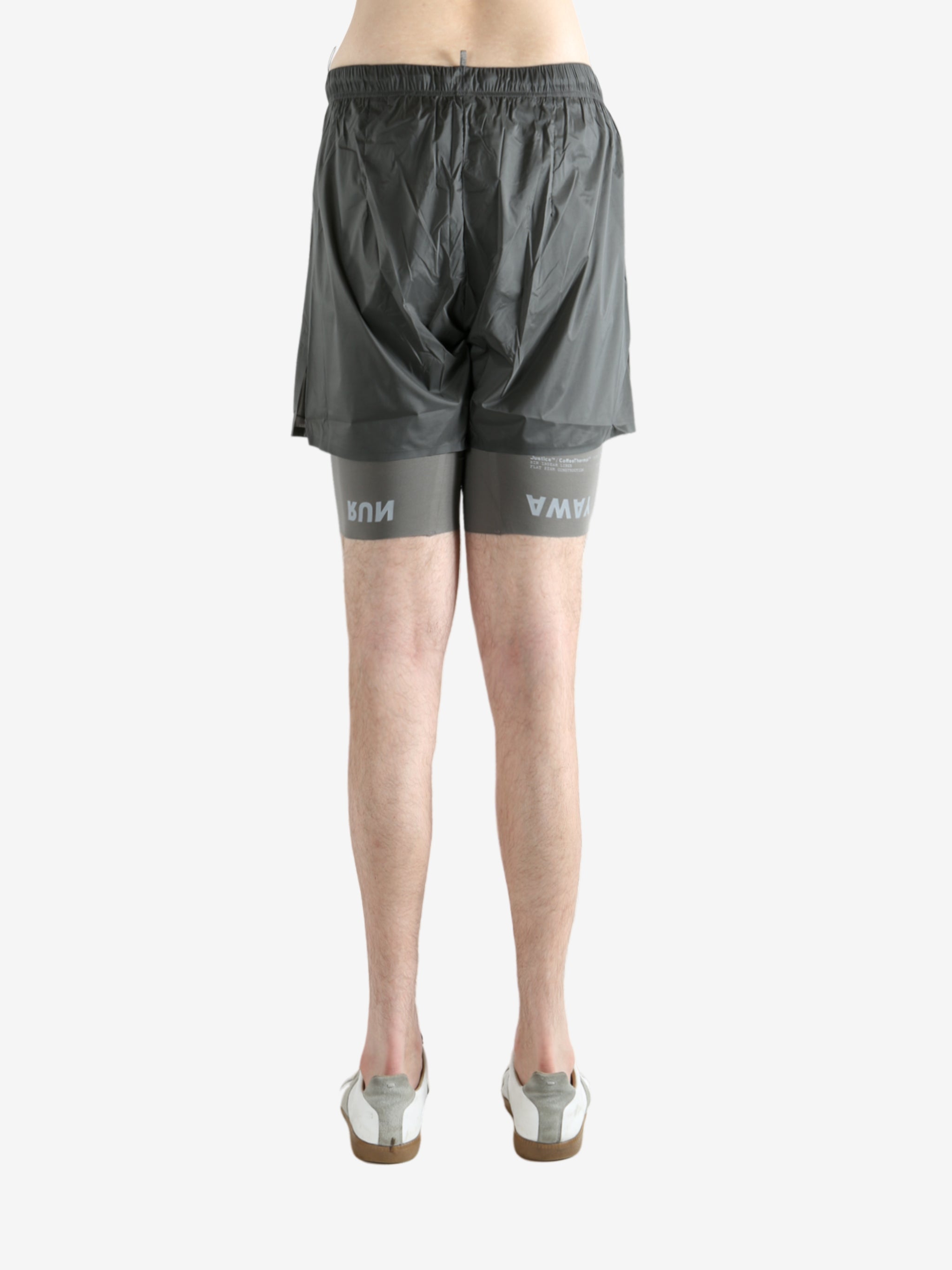 Grey shorts worn by a person, showing the shorts fit