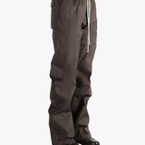 Brown pants worn by a person, showing the pants fit