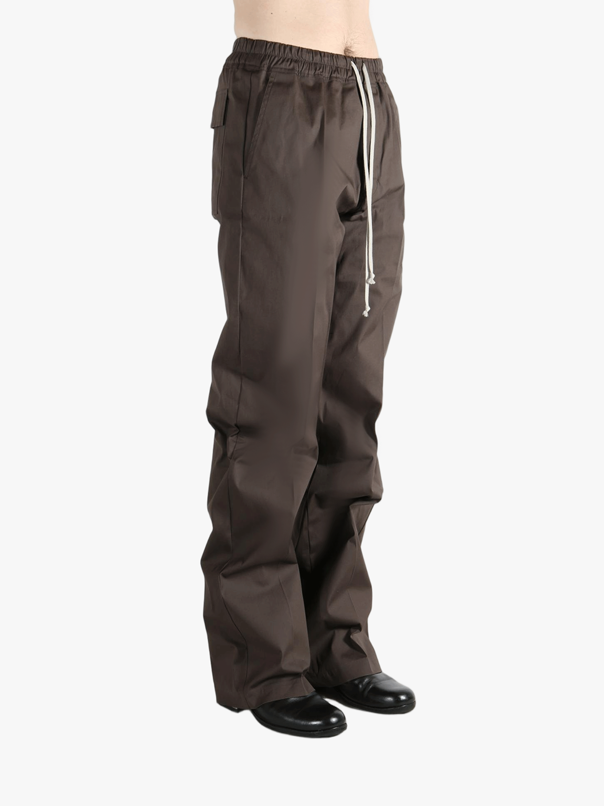 Brown pants worn by a person, showing the pants fit