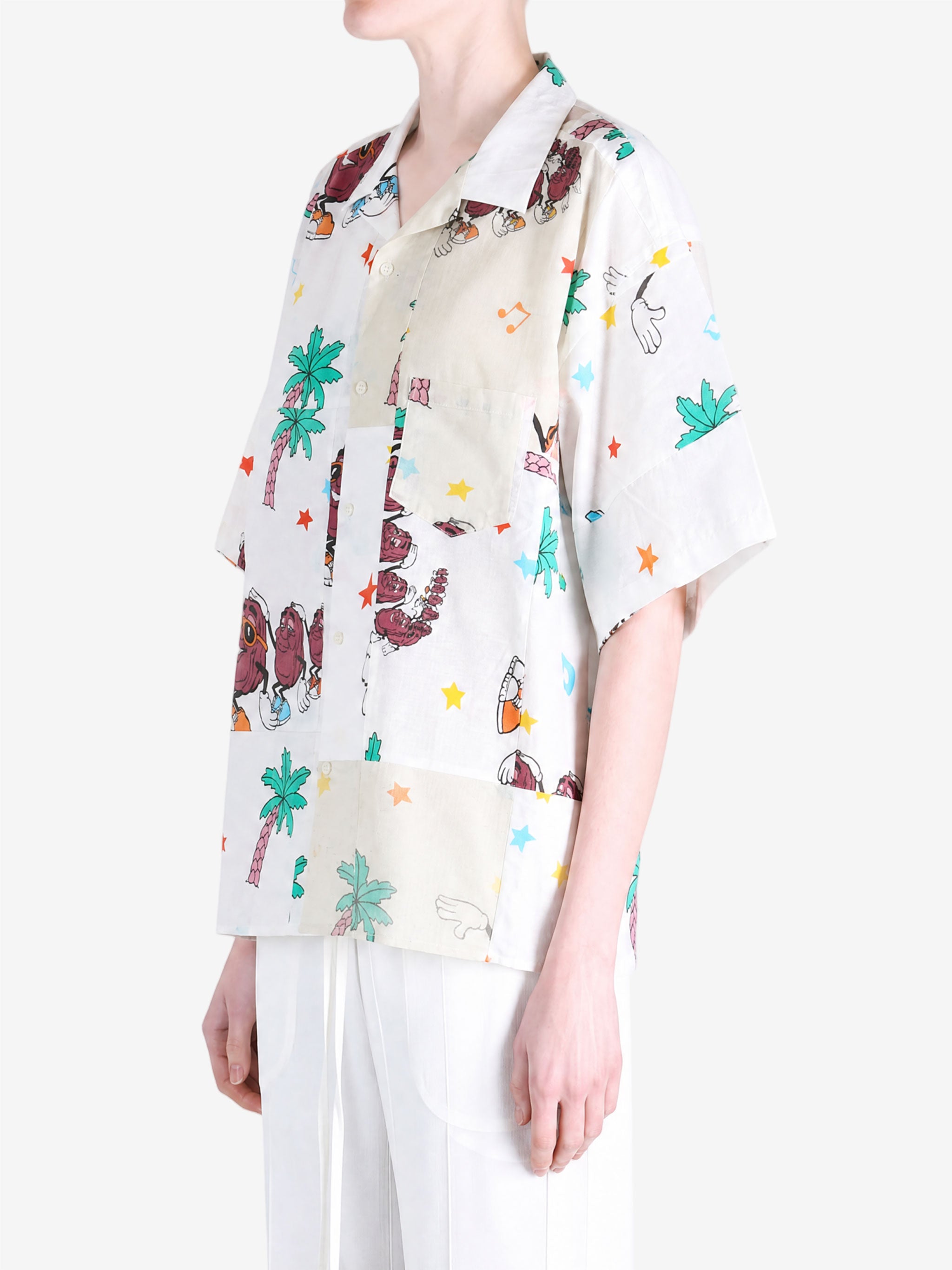 White shirt worn by a person, showing the shirt fit