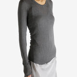 Grey t-shirt worn by a person, showing the shirt's fit