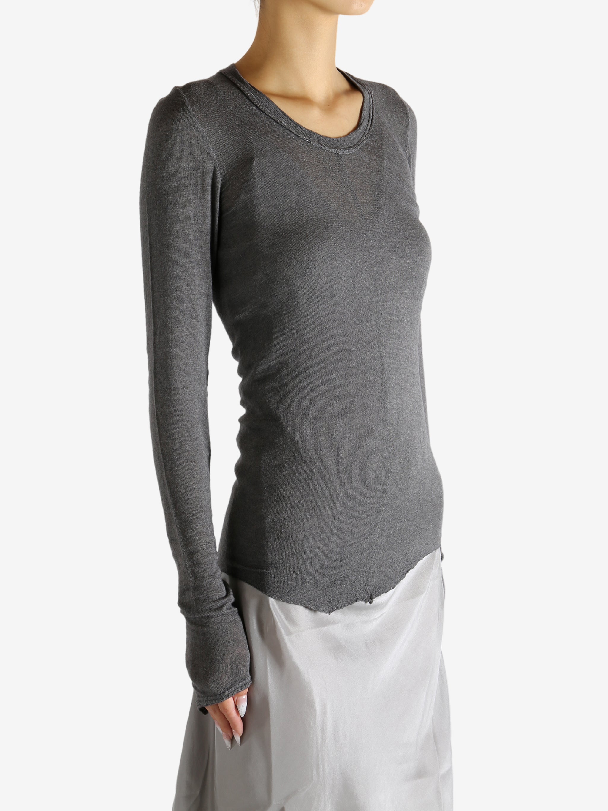 Grey t-shirt worn by a person, showing the shirt's fit