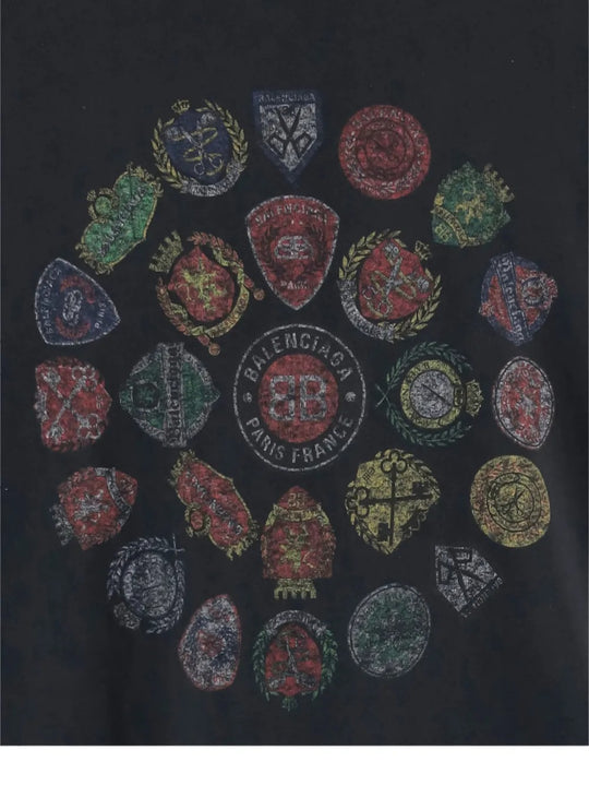 Close up of the black t-shirt, showing texture of the cotton fabric